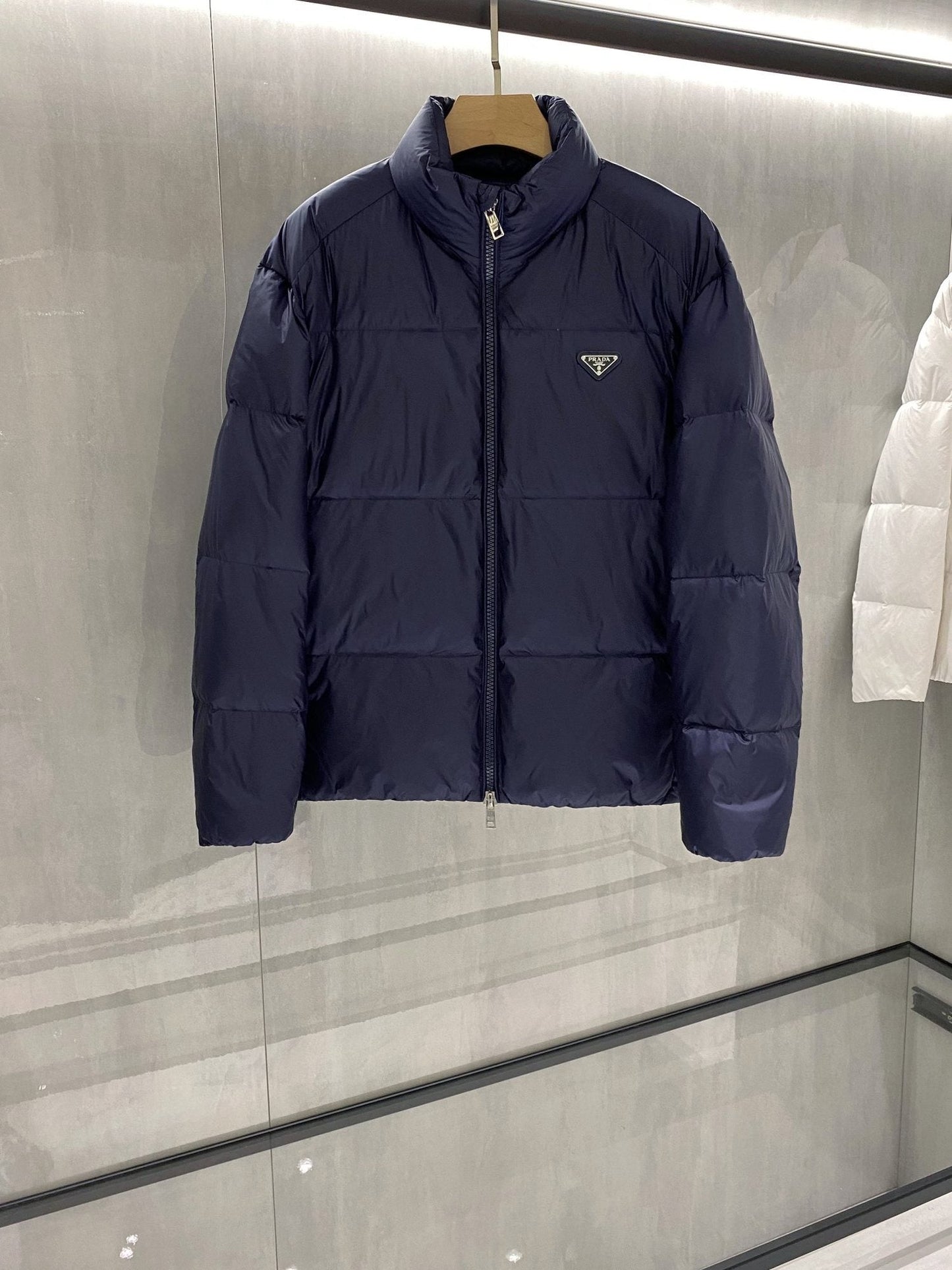 Prada Quilted Triangle Badge Puffer Jacket — hero