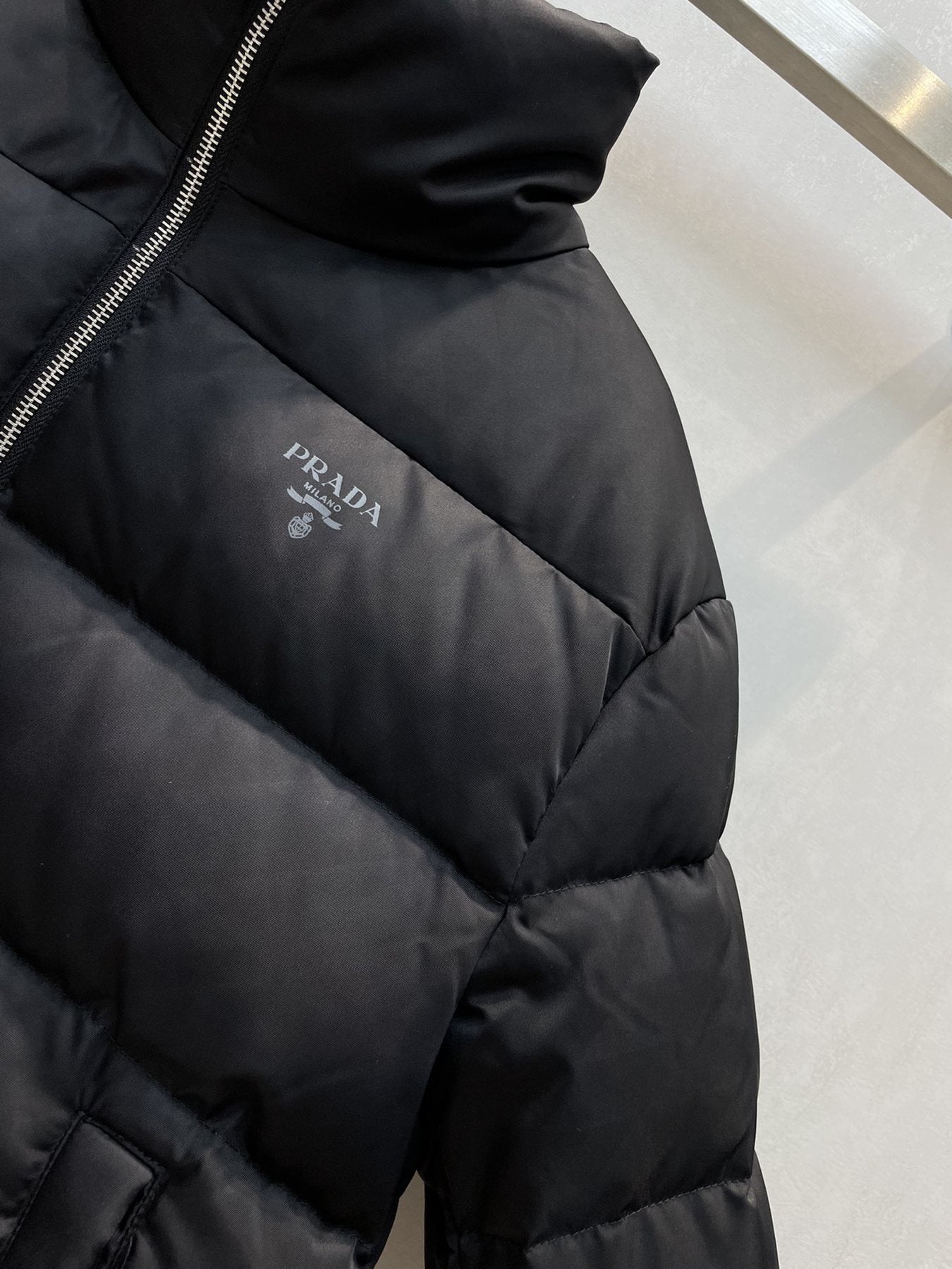 Prada Black Quilted Logo Puffer Jacket — detail