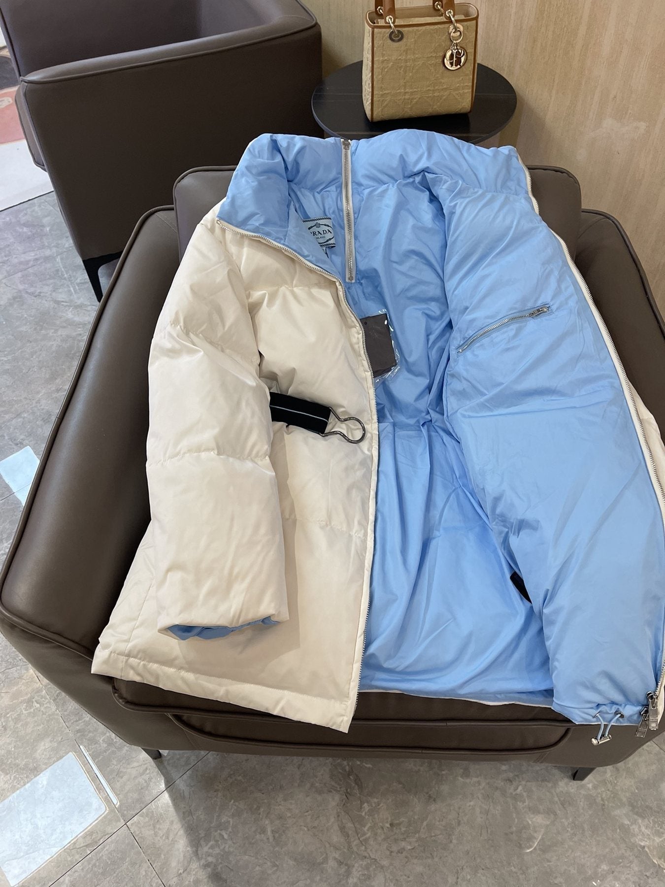 Prada Reversible Belted Long Puffer Jacket — detail