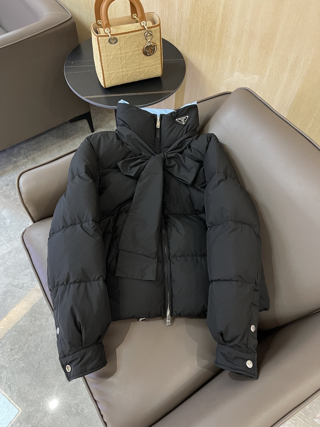 Prada Reversible Cropped Puffer Jacket with Removable Bow Scarf — front