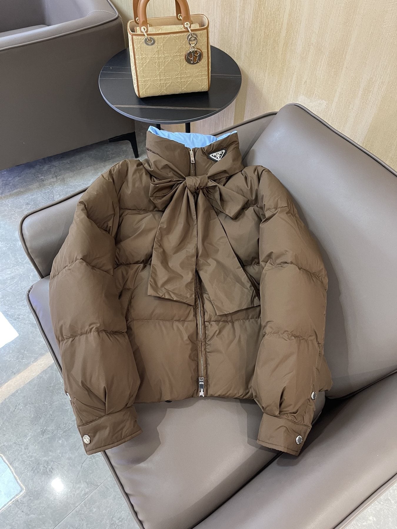Prada Reversible Cropped Puffer Jacket with Removable Bow Scarf — front