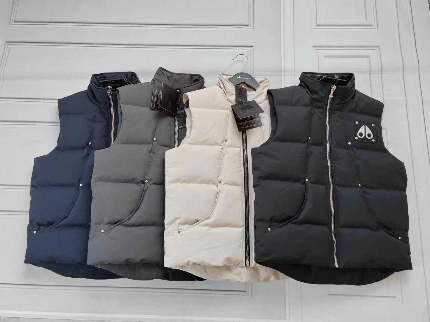 Moose Knuckles Quilted Down Vest — comparison