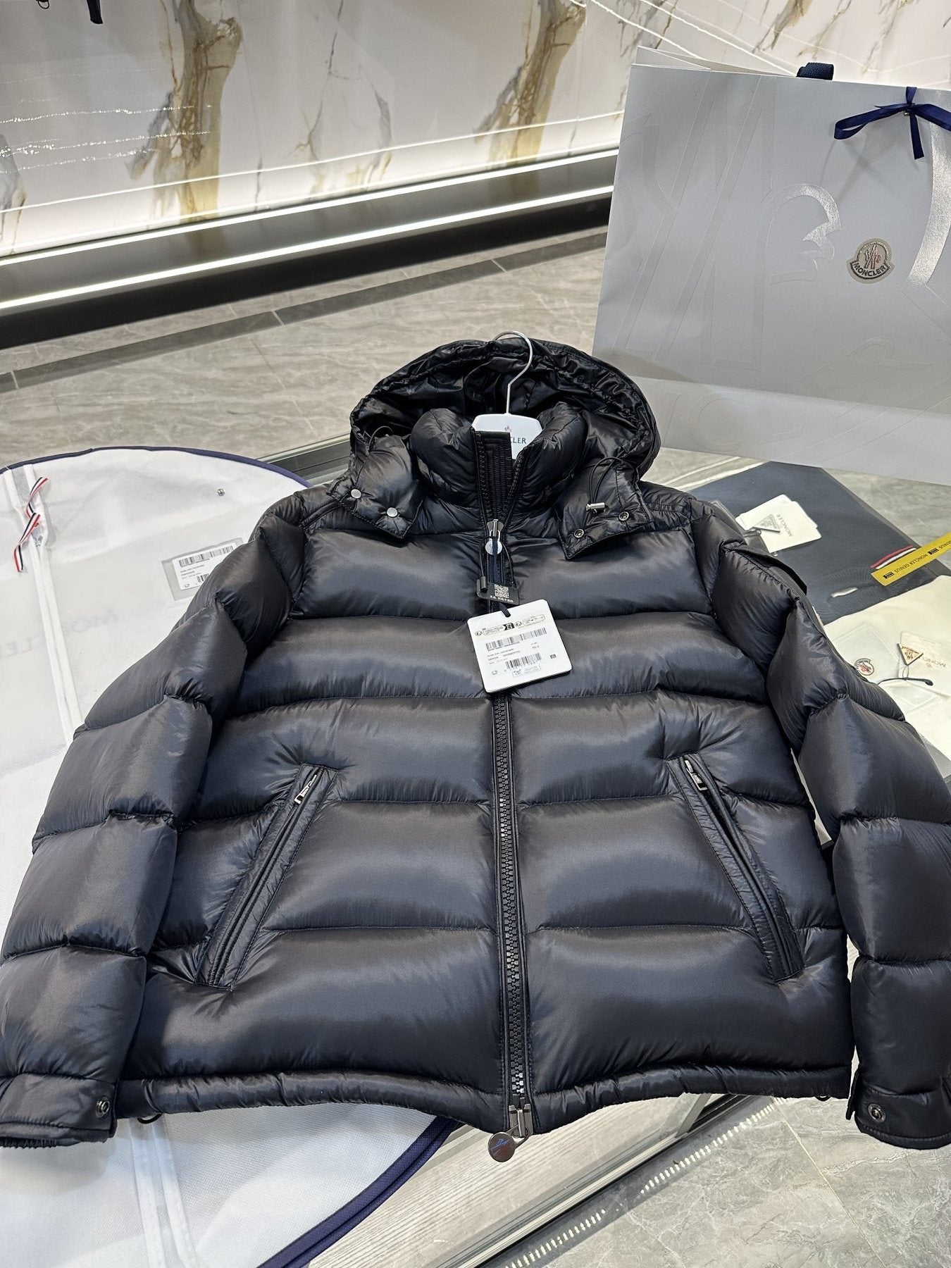 Moncler Black Glossy Hooded Puffer Coat — hang_tag