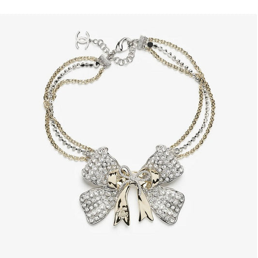 18K  Chanel 25K Bow Tie Choker Necklace