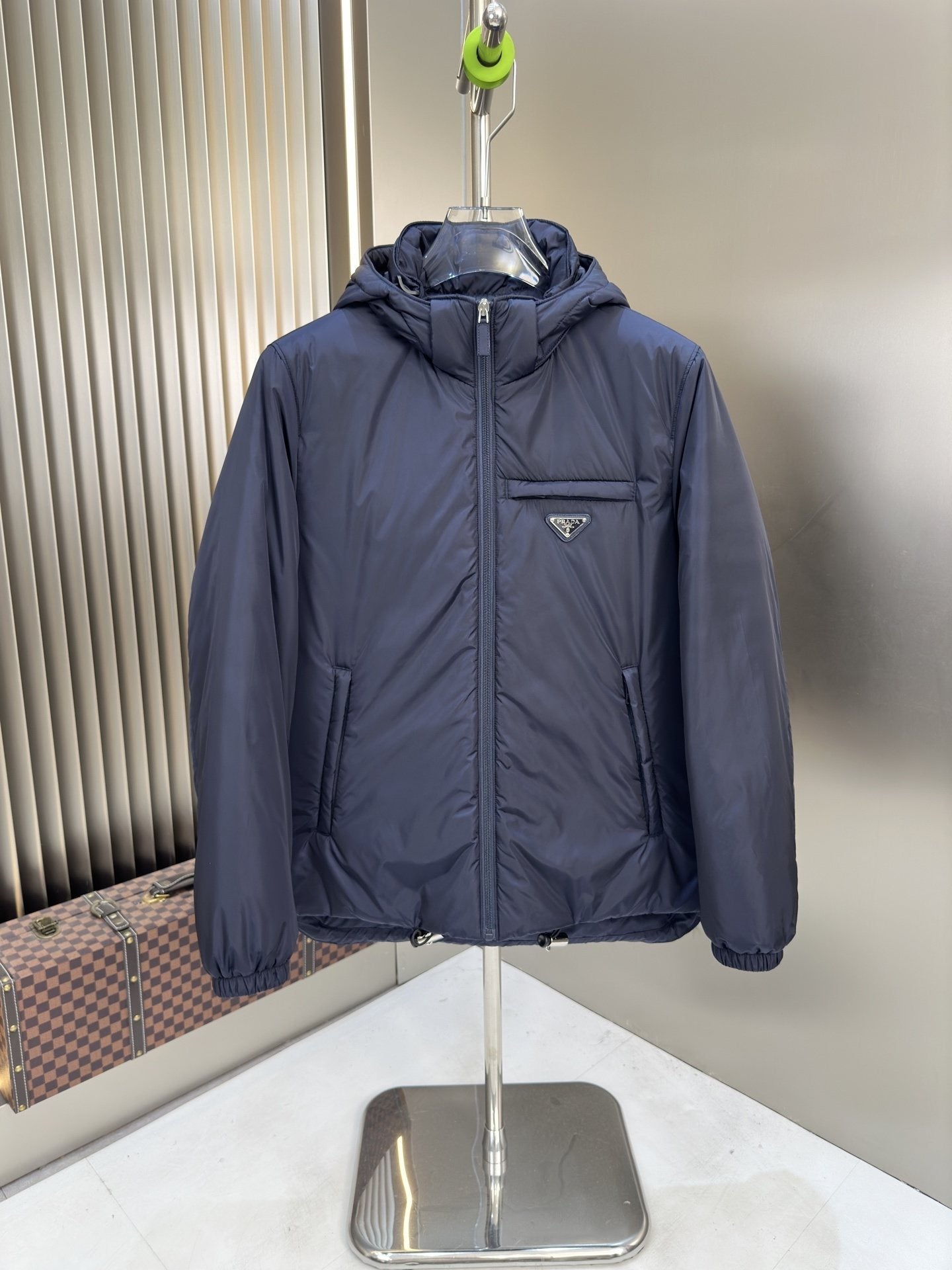 Prada Hooded Puffer Jacket with Triangle Chest Badge — hero